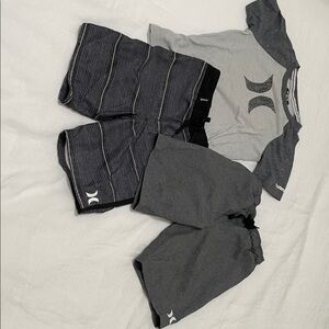 Hurley Gray shirt and Black Striped board shorts & a gray pair of size 6 shorts.